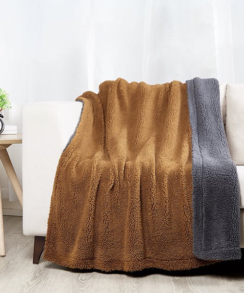 2) A Throw Blanket in the Same Shade